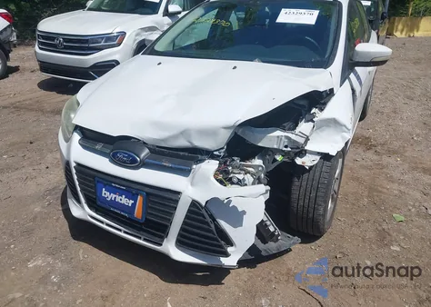 2014 Ford Focus Se z USA, uszkodzony, nr VIN 1FADP3F27EL128559